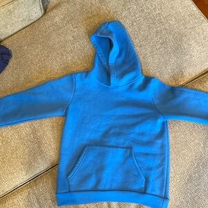 A blue kids large hoodie 95% cotton 5% spandex